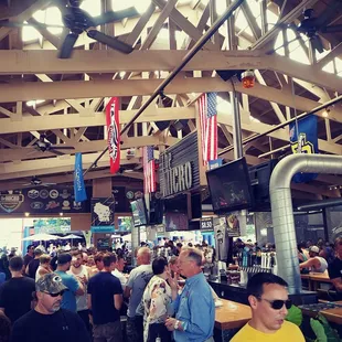 a large group of people at a bar