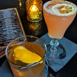 two cocktails on a table