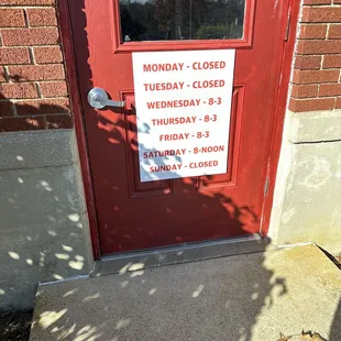 a closed sign on the door