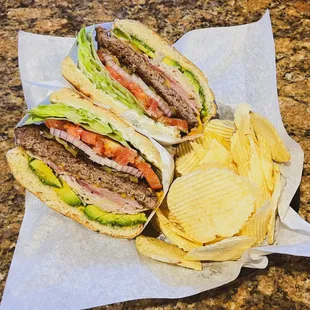 a sandwich and potato chips