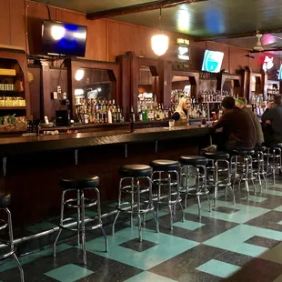 people sitting at the bar