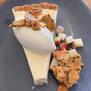 Lemon cream tart w nectarine and sesame brittle. (Minus the tiny bite I took before taking the pic and then devouring it)