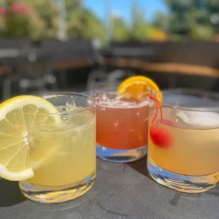 a variety of cocktails on a table
