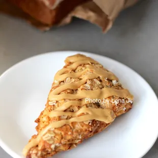 Seasonal Scone ($4) - Toasted Oat and Apple with Maple Glaze. It&apos;s good! Nice texture.