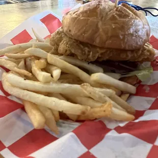 a basket of fries and a sandwich