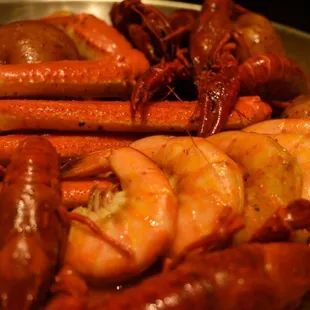 shrimp, crab legs, potatoes, and carrots