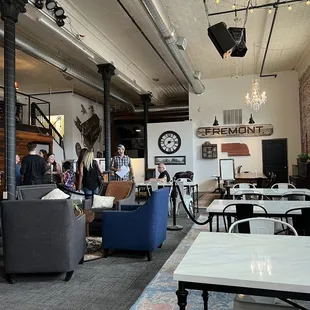 a man standing in a coffee shop