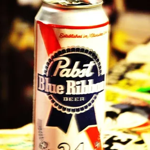 a can of beer on a table