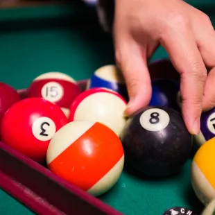 a pool table with billiards