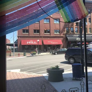 a view of a street through a window