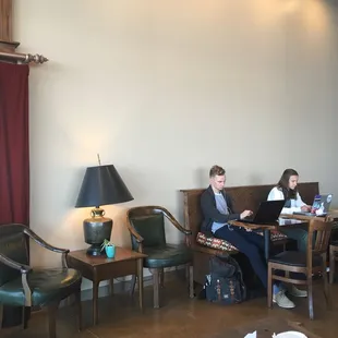 two people working on their laptops