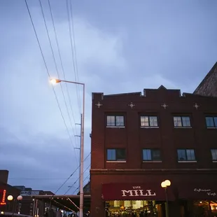  a street corner at dusk