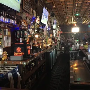 the bar area of a sports bar
