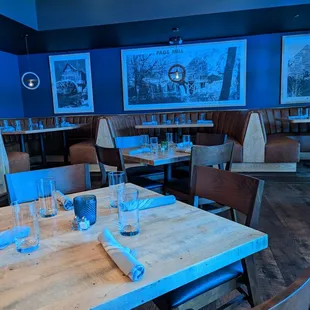 a dining room with tables and chairs