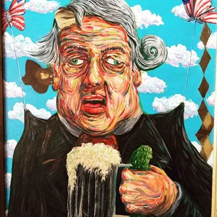 a man holding a beer