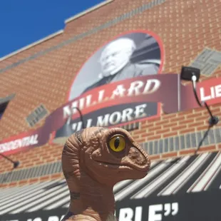 Bob the Raptor Says "I didn't see any books at this library but there is a lot of beer prey."