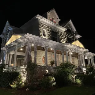the front of the house at night
