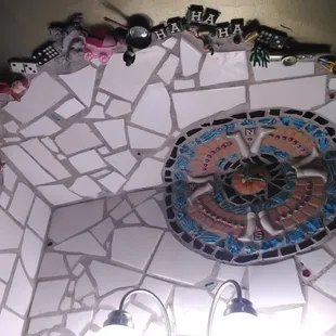 Seriously, you have to check out the bathrooms when you get here. The art is amazing!!!