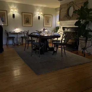 a dining room with a fireplace