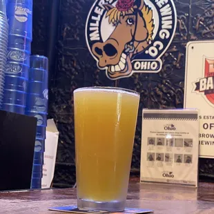 a glass of beer on the bar