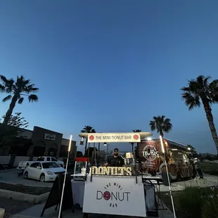 a man selling donuts