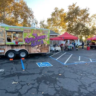 a food truck parked in a parking lot