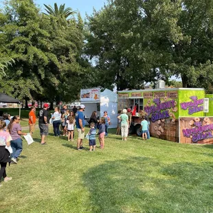 a crowd of people standing in line