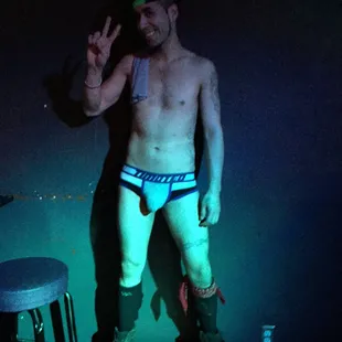 a shirtless man in underwear