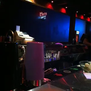 a bar with neon lights