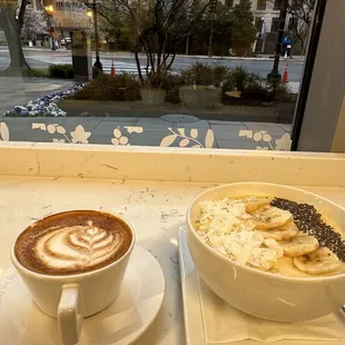 a cup of coffee and a plate of food