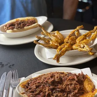 Frog legs with South Carolina sauce and Nathan's hotdog with pulled pork (in back)