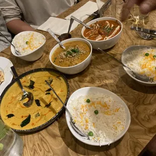 Extra Basmati Rice King Shrimp on left Vindaloo-Lamb (I think) in middle Murgh Makhanwala (aka butter chicken) on the right