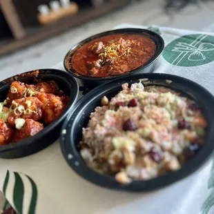 Gobi Lahsooni (left), Samosa Chaat (front), lamb vindaloo (right)
