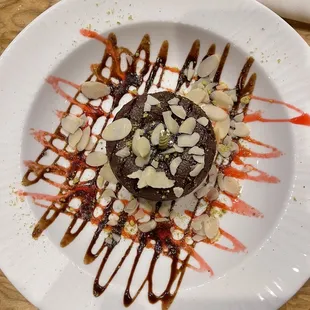 Complimentary birthday cake. It was moist, dense, chocolatey, and rich!  Perfect end to an amazing dining experience