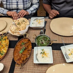 a table full of indian food