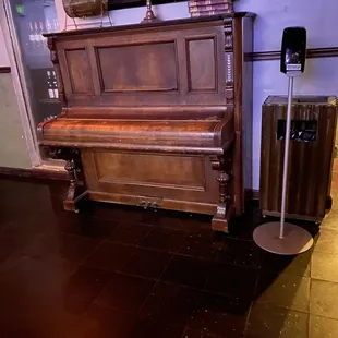 a piano and a suitcase