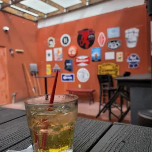 a drink in a glass on a table