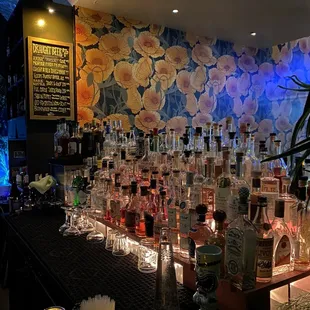 a bar filled with bottles and glasses
