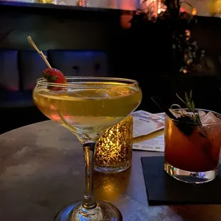 two cocktails on a table
