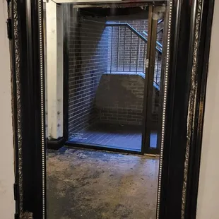 You can hear the music from the stairs. You can feel the vibration on the wall.