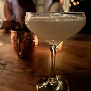 a woman sitting at a bar