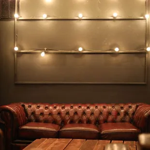 Couch seating area with light rack