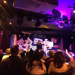 a group of people on stage