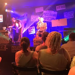 A wider view of the stage with Miss Behave and Tiffany.