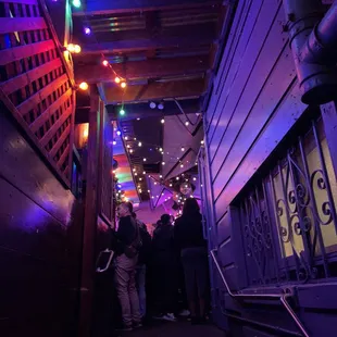 a group of people standing on the stairs