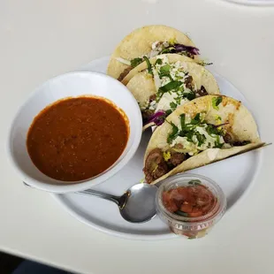 Steak tacos with a side of beans