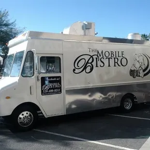 a food truck parked in a parking lot