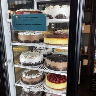 a display case full of cakes