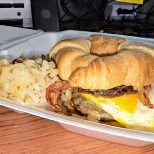 Croissant Breakfast Sandwich w/ hash browns