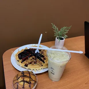 Matcha latte with waffle and muffin